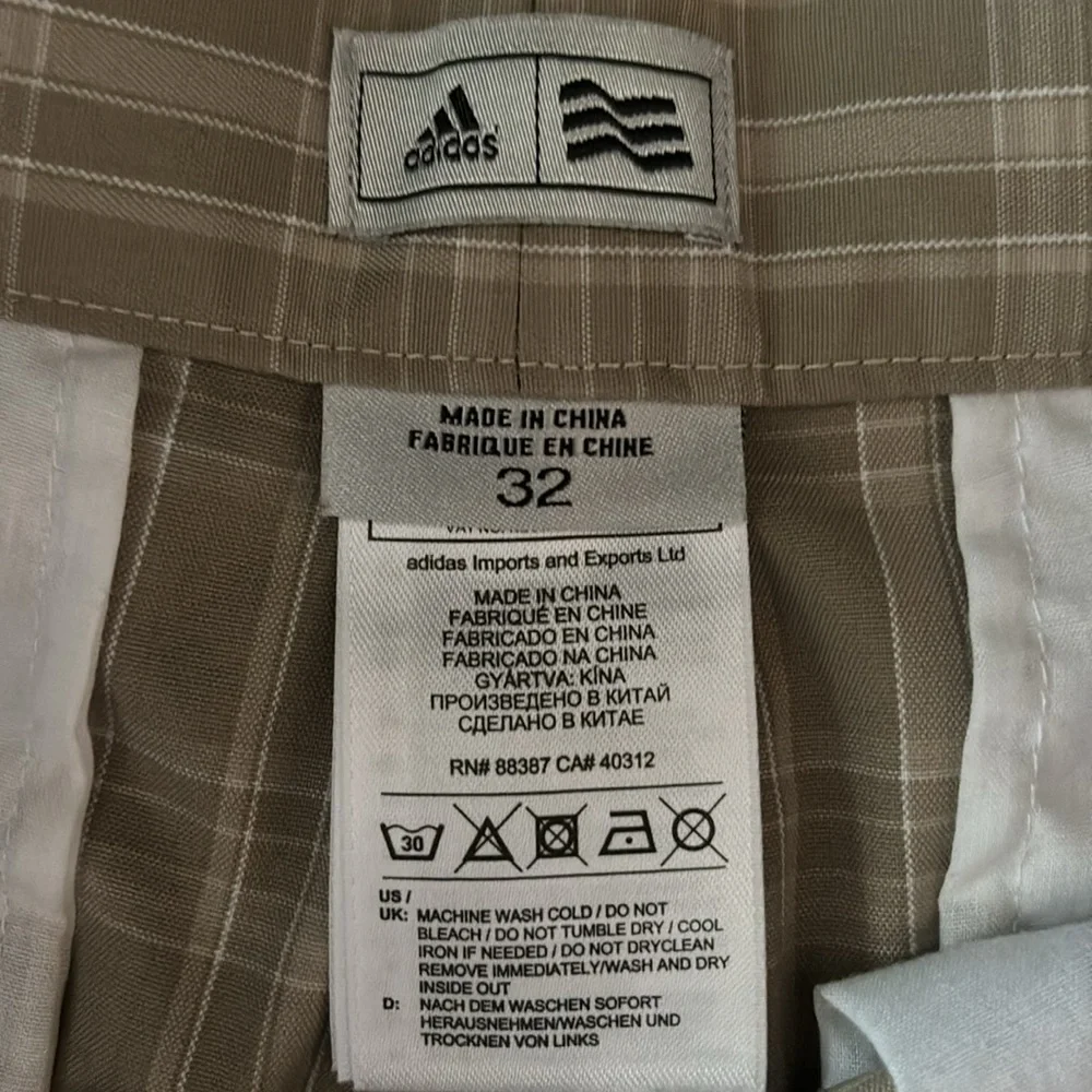 Men’s adidas 32 brown and tan plaid shorts